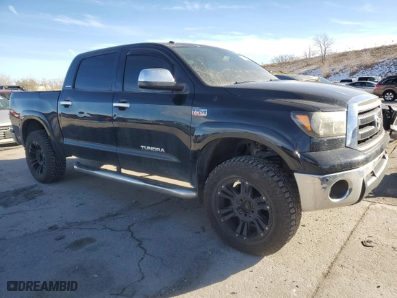 2011 Toyota Tundra 4WD Truck LTD with VIN 5TFHW5F15BX208044, listed as a Copart auction lot 82703564 with NaN miles and Salvage Title. Bid and sale history available at carsss.com. Image 4.