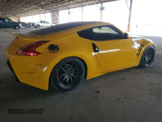 2009 Nissan 370Z with VIN JN1AZ44E09M407526, listed as a Copart auction lot 81125714 with 157,328 mi miles and Clean title. Bid and sale history available at DreamBid. Image 3.