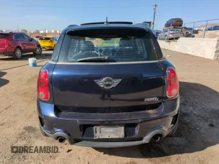 2012 MINI Countryman S with VIN WMWZC5C50CWL63321, listed as a Copart auction lot 52427065 with 126,898 mi miles and Salvage Title. Bid and sale history available at DreamBid. Image 6.