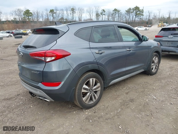 2017 Hyundai Tucson Value with VIN KM8J33A21HU359113, listed as a IAAI auction lot 41897638 with 80,010 mi miles. Bid and sale history available at carsss.com. Image 4.