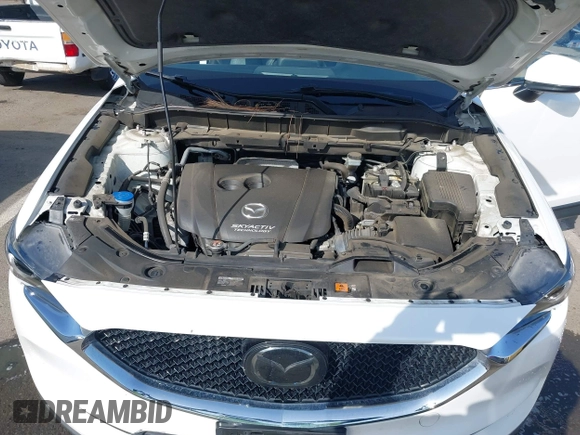 2017 Mazda CX-5 Grand Touring with VIN JM3KFADLXH0222341, listed as a IAAI auction lot 41990464 with 94,374 mi miles and . Bid and sale history available at carsss.com. Image 10.