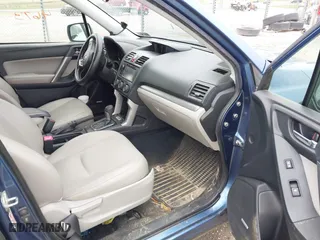 2015 Subaru Forester 2.5i Touring with VIN JF2SJAWC9FH415634, listed as a IAAI auction lot 41954673 with 140,507 mi miles. Bid and sale history available at carsss.com. Image 5.