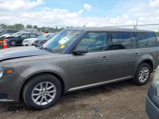 2014 Ford Flex SE z VIN 2FMGK5B81EBD02360, wystawiony jako IAAI lot #42383070 z przebiegiem 173 643 mil mil oraz . Historia ofert i sprzedaży dostępna na DreamBid. Obrazek 14.