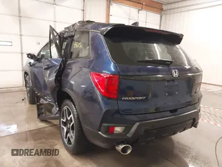 2022 Honda Passport Elite z VIN 5FNYF8H05NB013145, wystawiony jako IAAI lot #41355097 z przebiegiem 45 615 mil mil oraz . Historia ofert i sprzedaży dostępna na DreamBid. Obrazek 3.