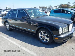 2001 Bentley Arnage with VIN SCBLC31E11CX06297, listed as a IAAI auction lot 41980275 with 63,510 mi miles and . Bid and sale history available at DreamBid. Image 1.