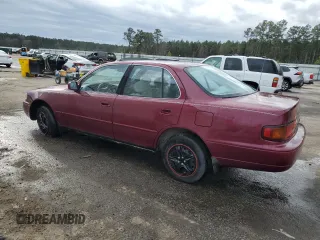 1996 Toyota Camry DX with VIN 4T1BG12KXTU739460, listed as a Copart auction lot 89107105 with 131,237 mi miles and Salvage Title. Bid and sale history available at carsss.com. Image 2.