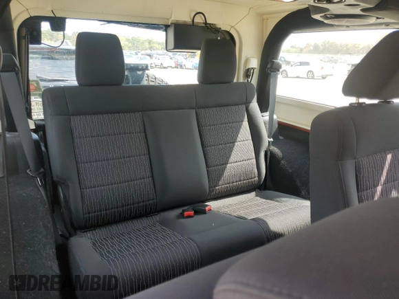 2011 Jeep Wrangler Sport with VIN 1J4AA2D15BL574234, listed as a Copart auction lot 52952605 with 114,642 mi miles and Salvage Title. Bid and sale history available at carsss.com. Image 10.