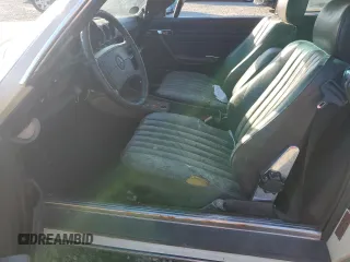 1988 Mercedes-Benz 560 SL with VIN WDBBA48D5JA080281, listed as a Copart auction lot 77695694 with 123,913 mi miles and Salvage Title. Bid and sale history available at carsss.com. Image 7.