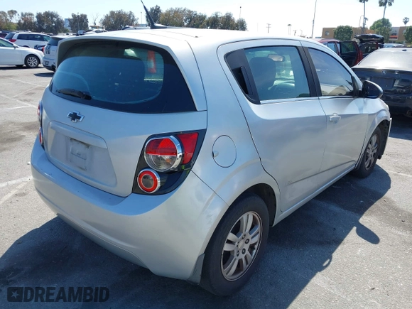2013 Chevrolet Sonic LT with VIN 1G1JC6SG0D4202398, listed as a IAAI auction lot 42067950 with 141,114 mi miles. Bid and sale history available at carsss.com. Image 4.