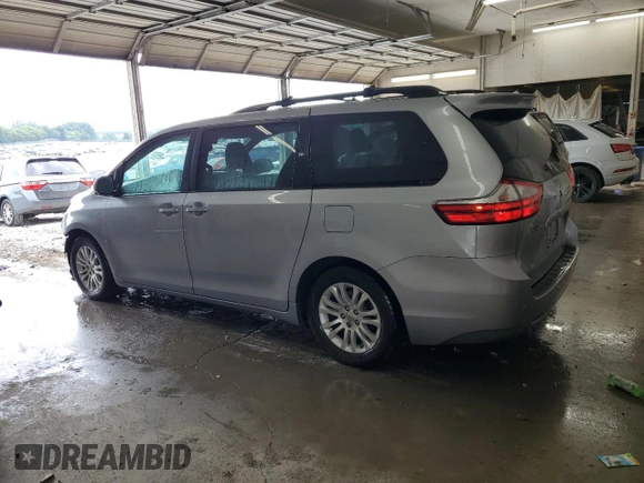 2016 Toyota Sienna XLE with VIN 5TDYK3DCXGS738530, listed as a Copart auction lot 61944505 with 254,176 mi miles and Salvage title. Bid and sale history available at DreamBid. Image 2.