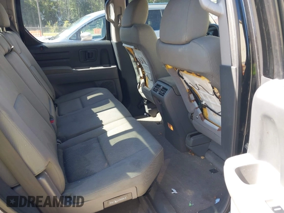 2009 Honda Ridgeline RT with VIN 5FPYK16269B107183, listed as a IAAI auction lot 42676377 with 264,721 mi miles and . Bid and sale history available at DreamBid. Image 8.
