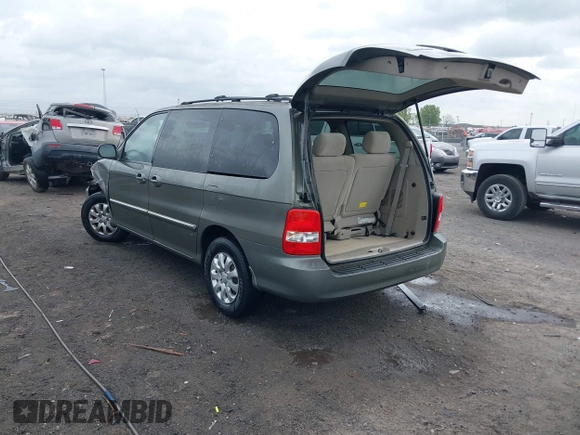 2005 Kia Sedona LX with VIN KNDUP132656734193, listed as a IAAI auction lot 41892342 with 91,768 mi miles. Bid and sale history available at carsss.com. Image 3.