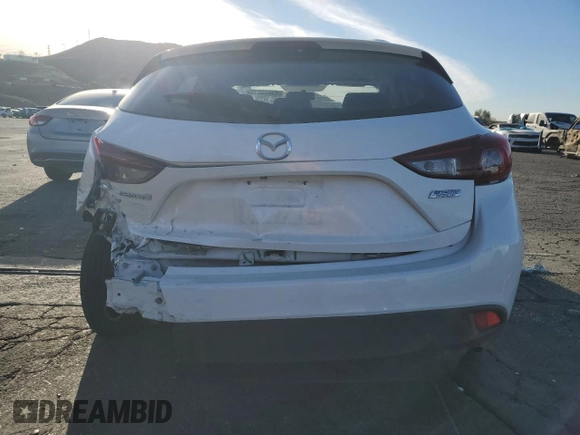 2016 Mazda 3 i Sport with VIN JM1BM1J72G1335411, listed as a Copart auction lot 42042015 with 104,275 mi miles and Salvage Title. Bid and sale history available at DreamBid. Image 6.
