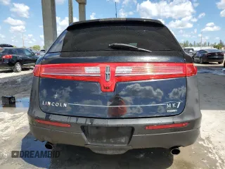 2014 Lincoln MKT EcoBoost with VIN 2LMHJ5AT7EBL50642, listed as a Copart auction lot 50880735 with 166,966 mi miles and Clean Title. Bid and sale history available at DreamBid. Image 6.