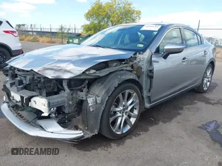 2014 Mazda 6 i Grand Touring with VIN JM1GJ1W57E1104801, listed as a IAAI auction lot 42060144 with 95,212 mi miles. Bid and sale history available at carsss.com. Image 2.