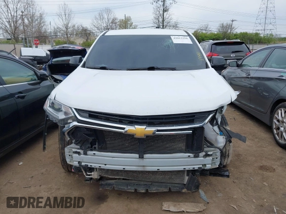 2020 Chevrolet Traverse LS z VIN 1GNERFKW7LJ258845, wystawiony jako IAAI lot #42013350 z przebiegiem 106 649 mil mil oraz . Historia ofert i sprzedaży dostępna na DreamBid. Obrazek 13.