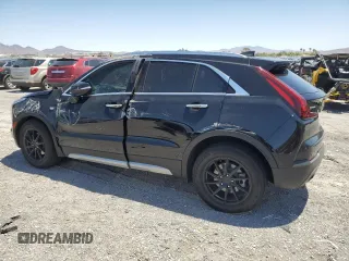 2021 Cadillac XT4 FWD Premium Luxury с VIN 1GYFZCR4XMF004996, выставлен на аукционе Copart как лот 61270355 с пробегом Не указан миль и Списание • Salvage title. История ставок и продаж доступна на DreamBid. Изображение 2.