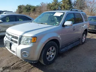 2011 Ford Escape Limited with VIN 1FMCU0EG0BKB94569, listed as a IAAI auction lot 41466649 with 86,748 mi miles. Bid and sale history available at carsss.com. Image 2.