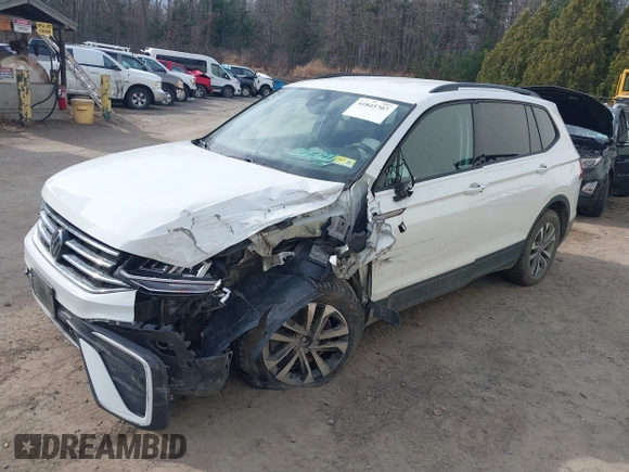 2022 Volkswagen Tiguan S z VIN 3VV0B7AX2NM097402, wystawiony jako IAAI lot #41845707 z przebiegiem 38 668 mil mil oraz . Historia ofert i sprzedaży dostępna na DreamBid. Obrazek 17.
