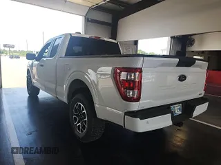 2023 Ford F-150 XL with VIN 1FTEX1EP1PKD56789, listed as a IAAI auction lot 42802275 with 52,497 mi miles and . Bid and sale history available at DreamBid. Image 7.