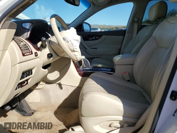 2010 Infiniti FX z VIN JN8AS1MW2AM856577, wystawiony jako Copart lot #52275445 z przebiegiem 99 298 mil mil oraz Nie do naprawy • Non repairable. Historia ofert i sprzedaży dostępna na DreamBid. Obrazek 7.