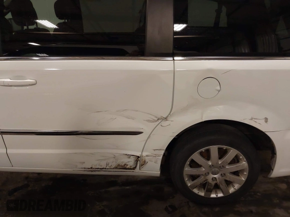 2015 Chrysler Town & Country Touring with VIN 2C4RC1BG9FR626482, listed as a IAAI auction lot 41879865 with 129,694 mi miles and . Bid and sale history available at DreamBid. Image 6.