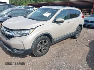 2018 Honda CR-V Touring with VIN 5J6RW2H96JL000910, listed as a IAAI auction lot 42490580 with 201,534 mi miles and . Bid and sale history available at DreamBid. Image 2.
