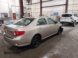 2009 Toyota Corolla with VIN 1NXBU40E19Z014460, listed as a IAAI auction lot 41973023 with 74,927 mi miles. Bid and sale history available at carsss.com. Image 4.