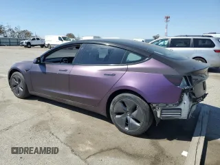 2019 Tesla Model 3 Long Range with VIN 5YJ3E1EB0KF437418, listed as a Copart auction lot 50729915 with 105,148 mi miles and Salvage Title. Bid and sale history available at DreamBid. Image 2.