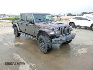 2020 Jeep Gladiator Mojave z VIN 1C6JJTEG8LL207481, wystawiony jako Copart lot #58009665 z przebiegiem 57 479 mil mil oraz Szkoda całkowita • Salvage title. Historia ofert i sprzedaży dostępna na DreamBid. Obrazek 13.