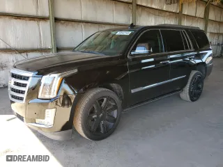 2015 Cadillac Escalade Premium with VIN 1GYS3NKJ3FR684673, listed as a Copart auction lot 50642145 with 127,105 mi miles and Salvage Title. Bid and sale history available at carsss.com. Image 1.