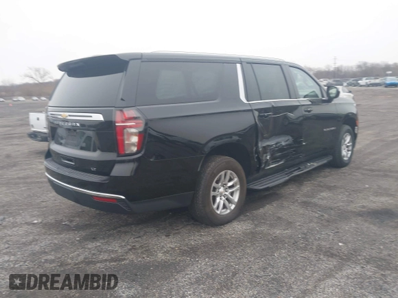 2023 Chevrolet Suburban LT with VIN 1GNSKCKD0PR129079, listed as a IAAI auction lot 41547855 with 158,820 mi miles and . Bid and sale history available at DreamBid. Image 4.