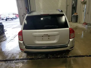 2011 Jeep Compass with VIN 1J4NT1FB0BD245673, listed as a Copart auction lot 82597074 with 207,695 mi miles and Clean Title. Bid and sale history available at carsss.com. Image 6.