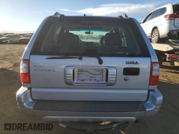 2003 Isuzu Rodeo with VIN 4S2DM58W734305363, listed as a Copart auction lot 85539774 with 219,300 mi miles and Salvage title. Bid and sale history available at DreamBid. Image 6.