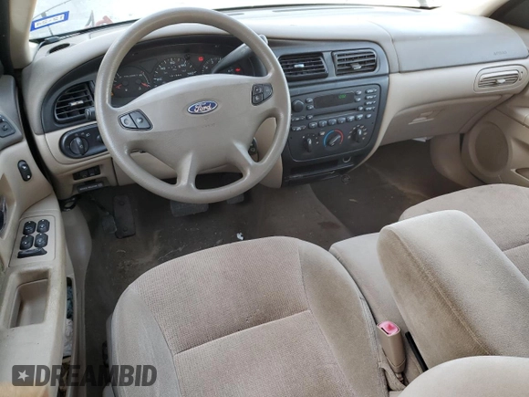 2002 Ford Taurus SE z VIN 1FAFP58S02G278065, wystawiony jako Copart lot #53030885 z przebiegiem 131 984 mil mil oraz Szkoda całkowita • Salvage title. Historia ofert i sprzedaży dostępna na DreamBid. Obrazek 8.