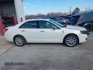 2012 Lincoln MKZ with VIN 3LNHL2JC4CR831614, listed as a IAAI auction lot 41883378 with 92,819 mi miles. Bid and sale history available at carsss.com. Image 13.