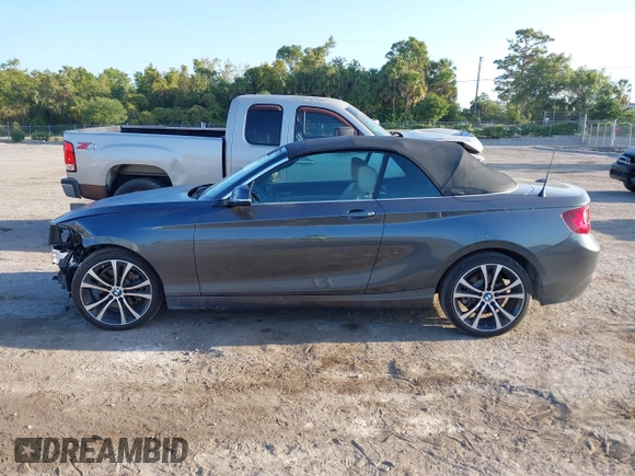 2020 BMW 2 Series 230i xDrive with VIN WBA2K1C08L7G28887, listed as a IAAI auction lot 42122785 with 30,599 mi miles and . Bid and sale history available at carsss.com. Image 14.