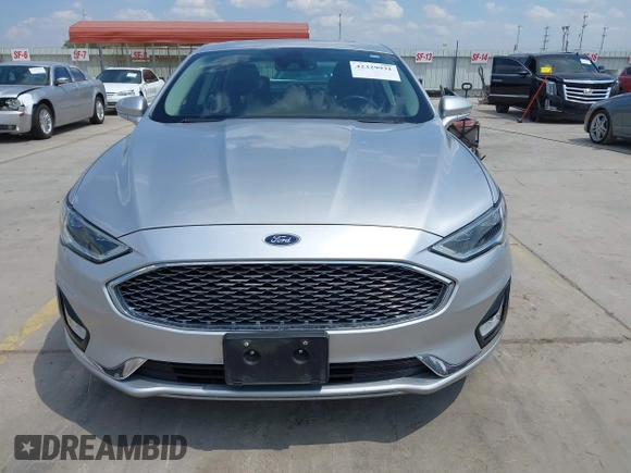 2019 Ford Fusion Titanium with VIN 3FA6P0RUXKR106430, listed as a IAAI auction lot 42329931 with 73,259 mi miles and . Bid and sale history available at DreamBid. Image 12.