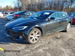 2020 Tesla Model S Long Range with VIN 5YJSA1E24LF413888, listed as a IAAI auction lot 41214903 with 42,711 mi miles and . Bid and sale history available at DreamBid. Image 6.