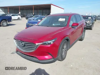 2016 Mazda CX-9 Touring z VIN JM3TCBCY7G0100311, wystawiony jako IAAI lot #41588448 z przebiegiem 115 364 mil mil oraz . Historia ofert i sprzedaży dostępna na DreamBid. Obrazek 2.