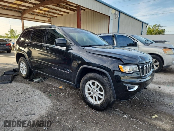 2020 Jeep Grand Cherokee Laredo E with VIN 1C4RJEAG7LC113542, listed as a Copart auction lot 62715585 with 64,124 mi miles and Salvage title. Bid and sale history available at DreamBid. Image 4.