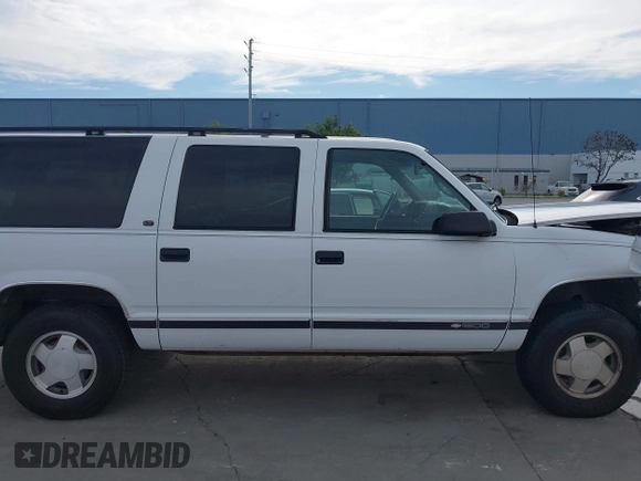 1997 Chevrolet Suburban with VIN 3GNFK16R9VG187426, listed as a IAAI auction lot 41678063 with 131,387 mi miles. Bid and sale history available at carsss.com. Image 13.