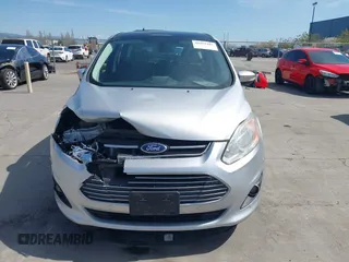 2013 Ford C-Max SEL z VIN 1FADP5BU6DL518893, wystawiony jako IAAI lot #41962282 z przebiegiem 198 219 mil mil oraz . Historia ofert i sprzedaży dostępna na DreamBid. Obrazek 12.