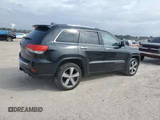 2015 Jeep Grand Cherokee Overland with VIN 1C4RJFCT6FC628729, listed as a Copart auction lot 44979155 with 105,959 mi miles and Salvage Title. Bid and sale history available at DreamBid. Image 3.