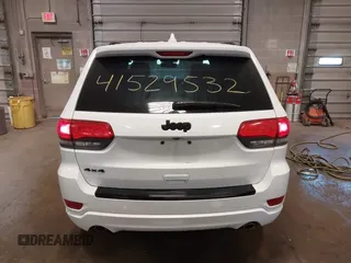 2015 Jeep Grand Cherokee Laredo with VIN 1C4RJFAG4FC660665, listed as a IAAI auction lot 41529532 with 124,099 mi miles. Bid and sale history available at carsss.com. Image 16.