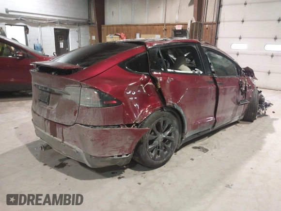 2023 Tesla Model X with VIN 7SAXCDE51PF403632, listed as a IAAI auction lot 41328722 with Not Provided miles and . Bid and sale history available at DreamBid. Image 4.