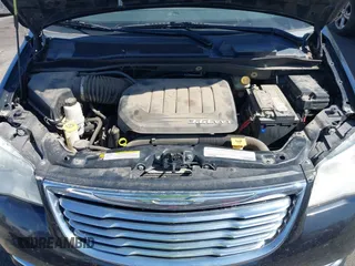 2011 Chrysler Town & Country Touring with VIN 2A4RR5DG2BR702731, listed as a IAAI auction lot 42095661 with 202,968 mi miles and . Bid and sale history available at DreamBid. Image 10.