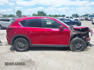 2019 Mazda CX-5 Touring with VIN JM3KFACM6K1549234, listed as a IAAI auction lot 42036633 with 85,065 mi miles and . Bid and sale history available at carsss.com. Image 14.