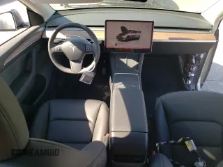 2024 Tesla Model Y Long Range с VIN 7SAYGAEE6RF131749, выставлен на аукционе Copart как лот 74548014 с пробегом 1 042 миль миль и Списание • Salvage title. История ставок и продаж доступна на DreamBid. Изображение 8.