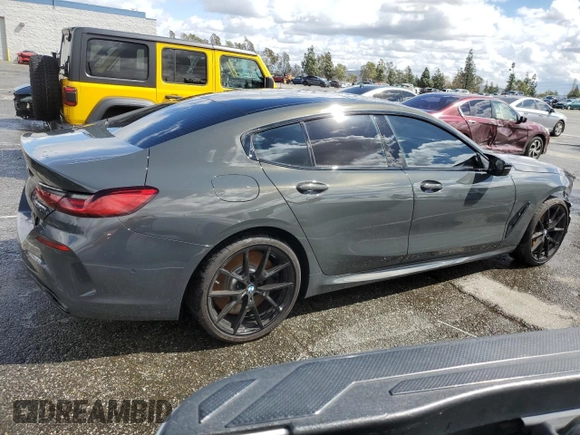 2025 BMW 8 Series M850i with VIN WBAGV8C07SCT18237, listed as a Copart auction lot 49277375 with 750 mi miles and Salvage title. Bid and sale history available at DreamBid. Image 3.